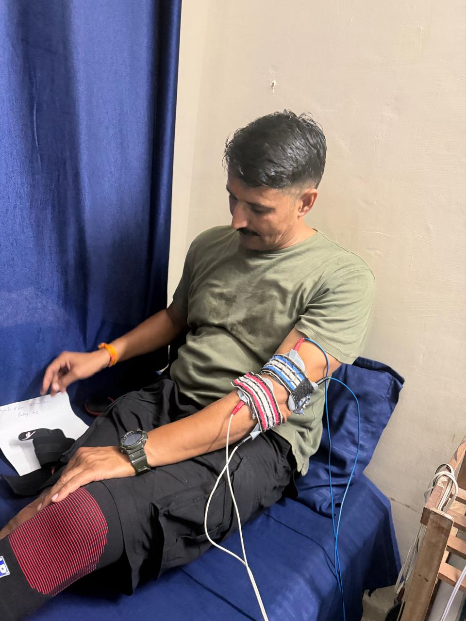 TENS electrical stimulation therapy for arm pain at Hi-Tech Physiotherapy Dehradun