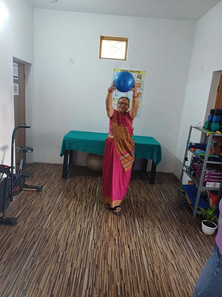 Shoulder and core exercise with stability ball at Hi-Tech Physiotherapy Dehradun