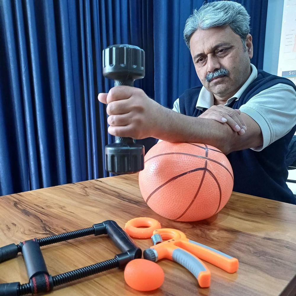 Hand and grip strength therapy session at Hi-Tech Physiotherapy Dehradun