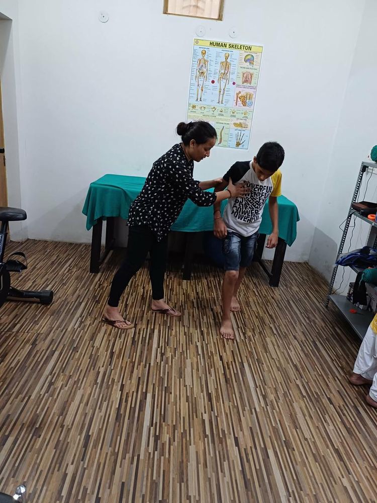 Pediatric gait training with therapist support at Hi-Tech Physiotherapy Dehradun